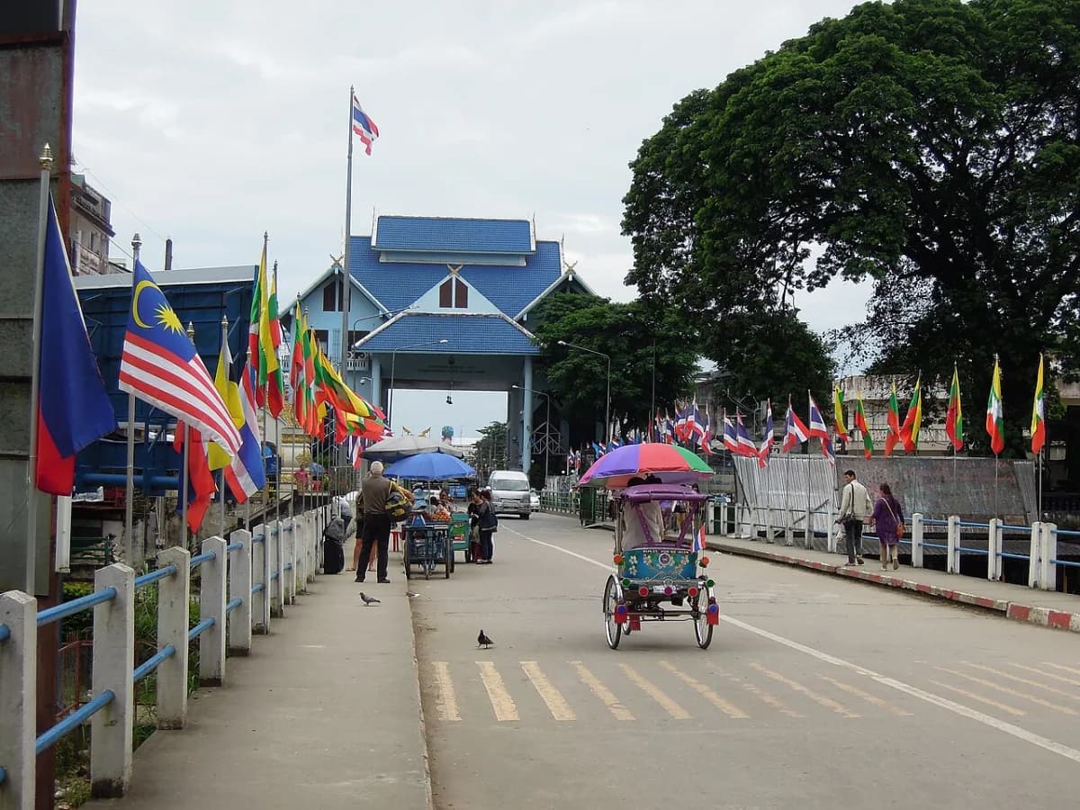 Mae Sai and Tachileik border bridge with Thai and Myanmar flags