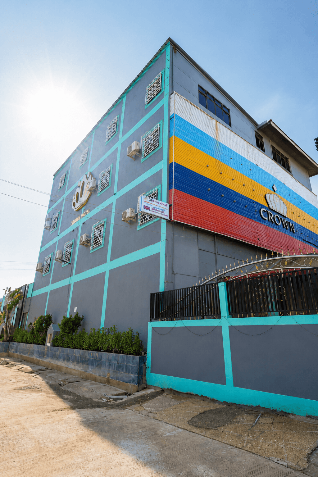 Street-side view of The Crown Hotel in Tachileik